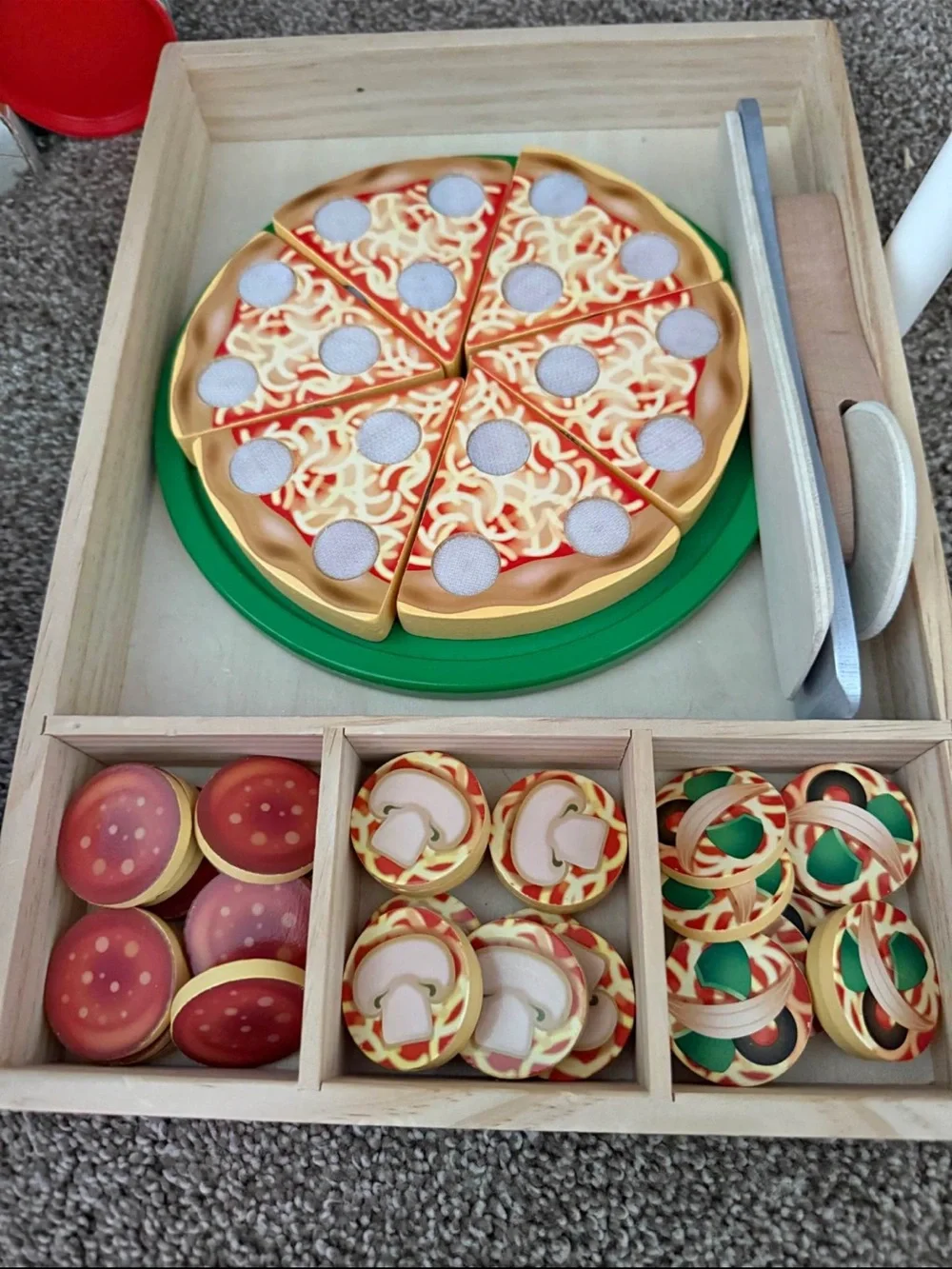 wooden toy set is a Melissa & Doug Pizza Party set
